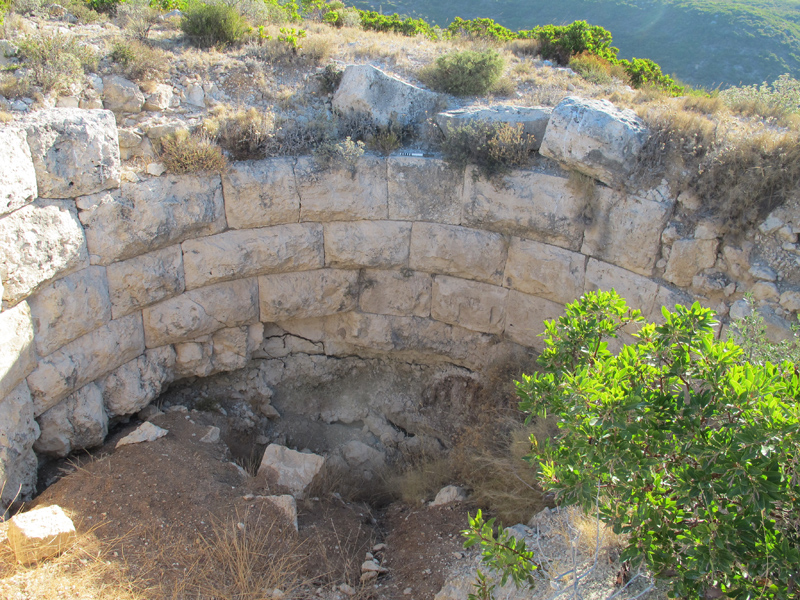 Circular structure (foundations? cistern?) on Çadır Tepe, incl. robber excavations. Photo: Toby Wilkinson Photo of circular structure